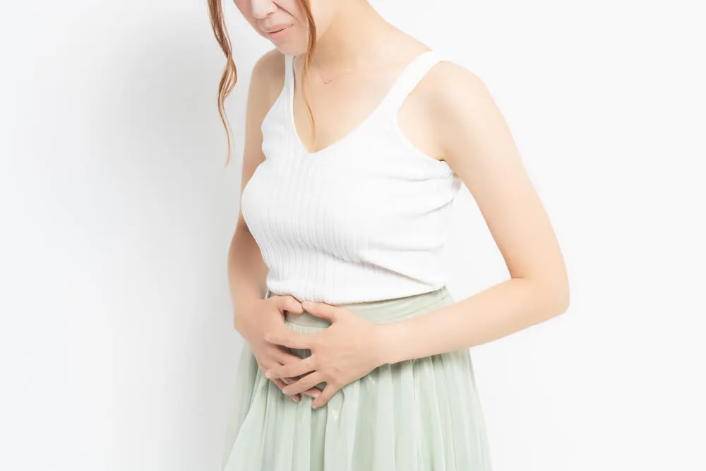 Women holding the stomach